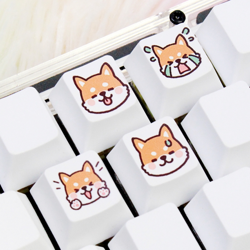 4 keycaps with fox patterns